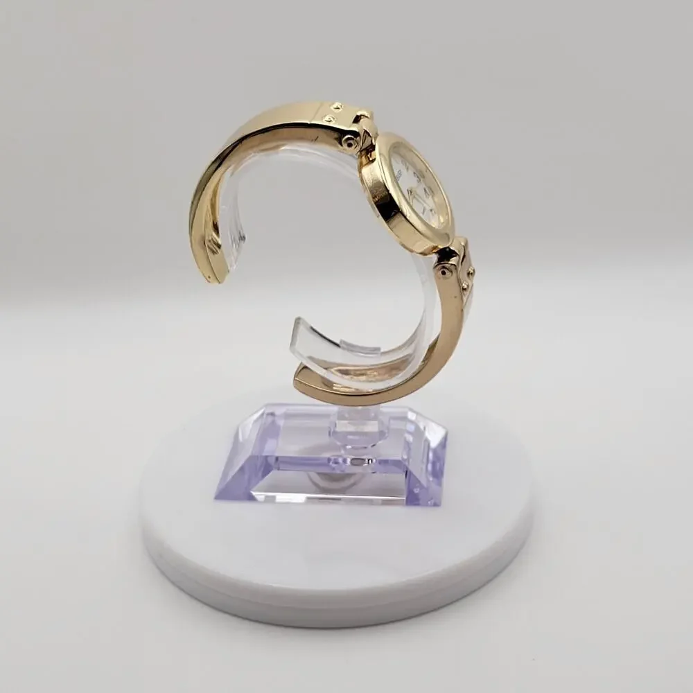 Embassy Womens Gold Tone Bangle Cuff Quartz Watch White Dial Gold Numerals